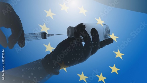 Liquid is drawn into the syringe against the background of the EU flag. Medicine and pharmacology. Genetic research. Computer graphics and double exposure on a hand with a syringe moving shapes