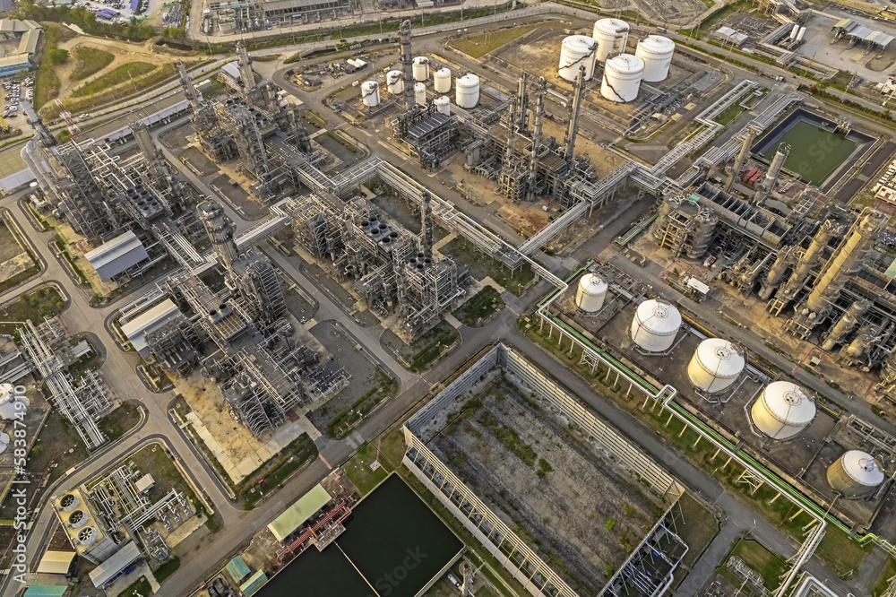 Oil refinery plant from industry zone, Aerial view oil and gas petrochemical industrial.