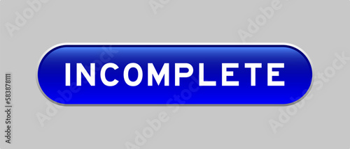 Blue color capsule shape button with word incomplete on gray background