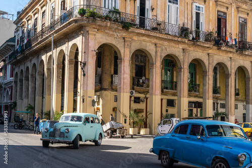 Ancient classic cars on the road, Old Havana photo