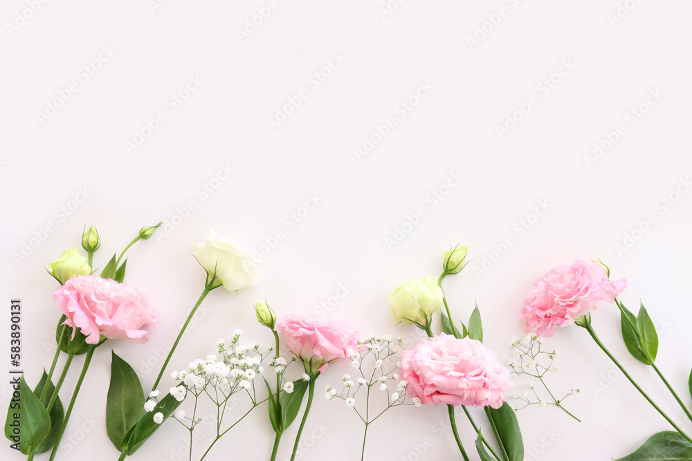Top view image of delicate bouquet flowers over isolated white background Top view image of delicate bouquet flowers over isolated white background