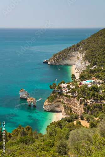 Faraglioni di Baia delle Zagare rocks with beaches and coastline, near Mattinata, Gargano peninsula, Foggia province, Puglia photo