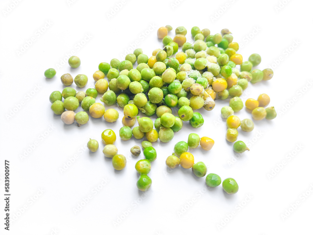 picture of frozen green peas melting on white background.Half ripe green pea.Green peas was kept in freezer for preservation picture of frozen green peas melting on white background.Half ripe green pea.Green peas was kept in freezer for preservation