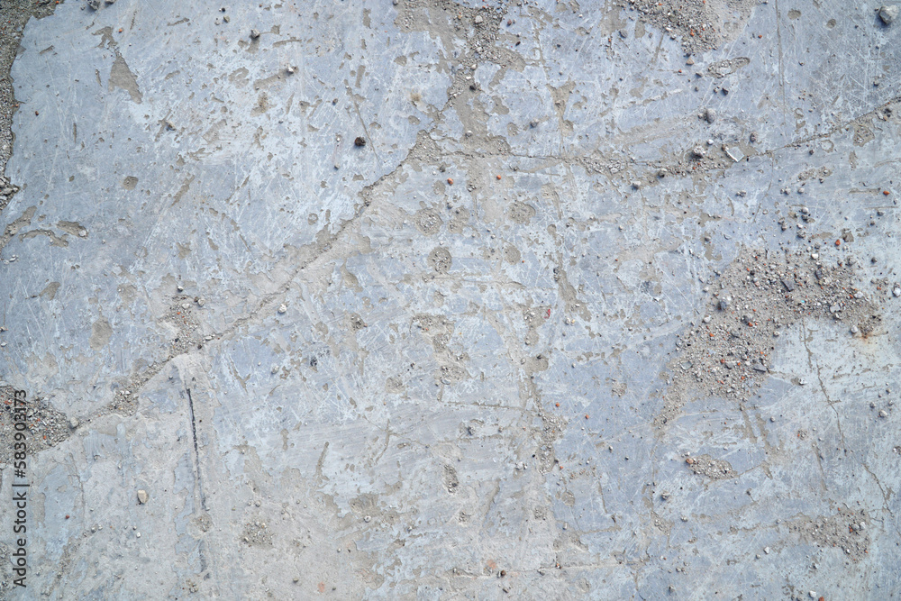 Grey concrete surface with many scratches Grey concrete surface with many scratches