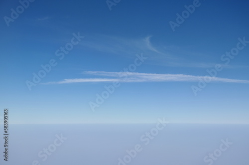 landscape of cloud floating on sky through window plane © pedphoto36pm