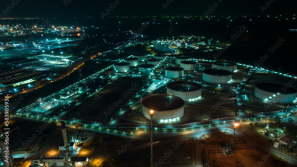 cityscape night scene shot oil storage tank and oil refinery factory zone, global business and industry about natural resources wasteful for transportation and trading, aerial view cityscape night scene shot oil storage tank and oil refinery factory zone, global business and industry about natural resources wasteful for transportation and trading, aerial view
