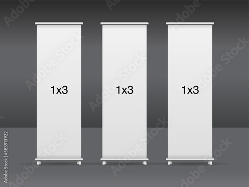 Set of 3 empty standee or rollup banner display mockup on isolated white background. Display mockup for presentation or exhibition product. Vertical blank roll up stand template in 1x2 sizes.