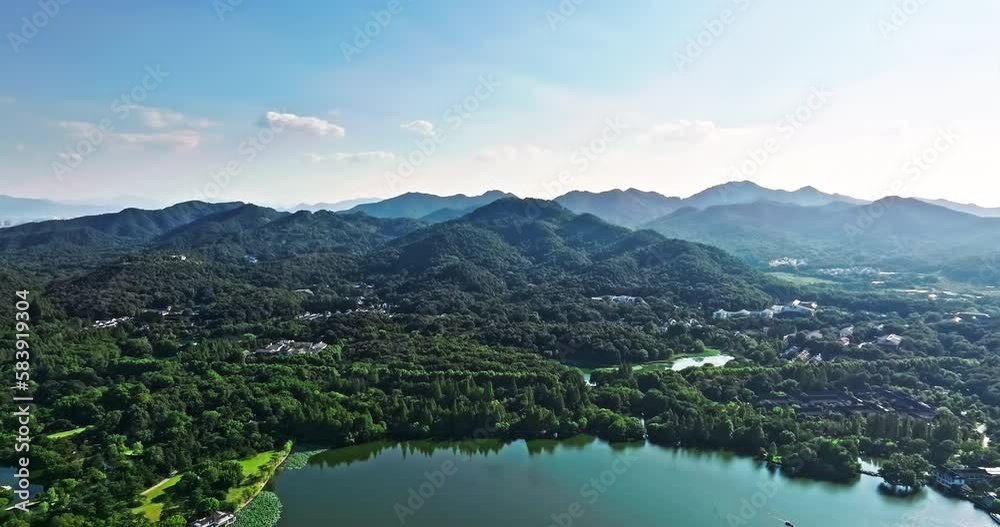 Aerial view of the beautiful West Lake natural scenery in Hangzhou, Zhejiang Province, China. Green mountain natural landscape in summer. Aerial view of the beautiful West Lake natural scenery in Hangzhou, Zhejiang Province, China. Green mountain natural landscape in summer.