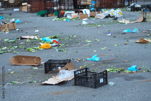 End of market day on central open air market Dolac Zagreb Croatia - waste and junk waiting for cleaning service photo