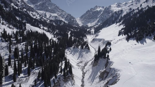 Flying over a mountain river bed