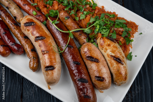 Grilled different sausage w...