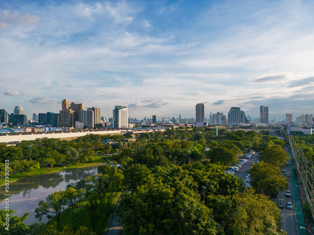 Aerial view green tree park in Chatuchak public park with office building