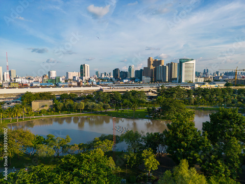 Aerial view green tree park in Chatuchak public park with office building