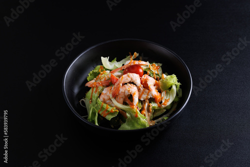 Japanese salad isolated in black background