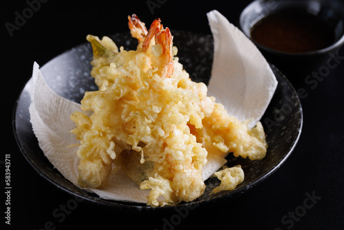 Shrimp tempura Japanese food isolated on a black background