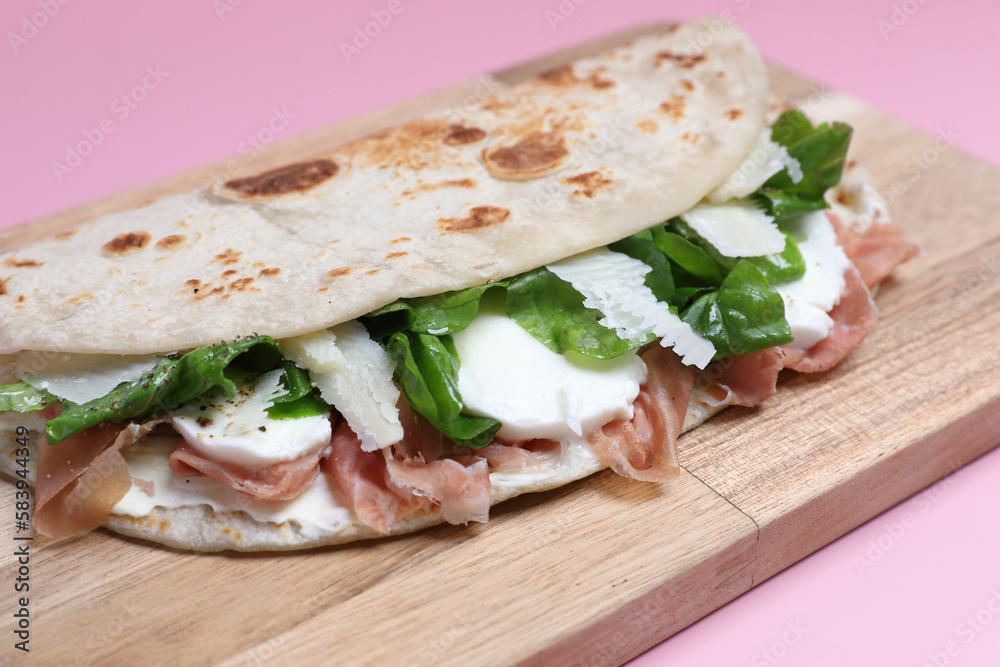 Obraz premium Italian cuisine , Piadina with Italian ham and cheese