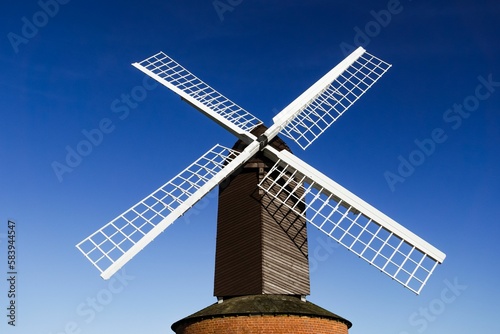 Low angle shot of Brill Windmill against a clear, blue sky in winter on Christmas Day
