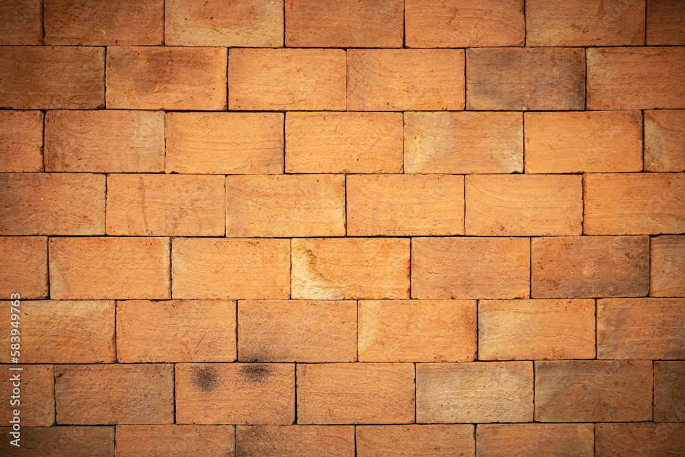 Fototapeta premium Background of brick wall texture, Modern brick wall, red brick wall or brick texture for background. Wall construction with orange clay bricks for beauty and strength.