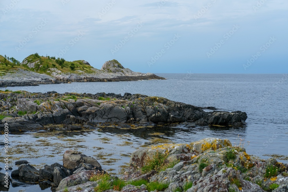 Beautiful view of rock formations at the coastline in Refviksanden Beach