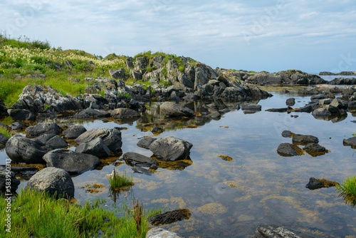 Beautiful view of rock formations at the coastline in Refviksanden Beach