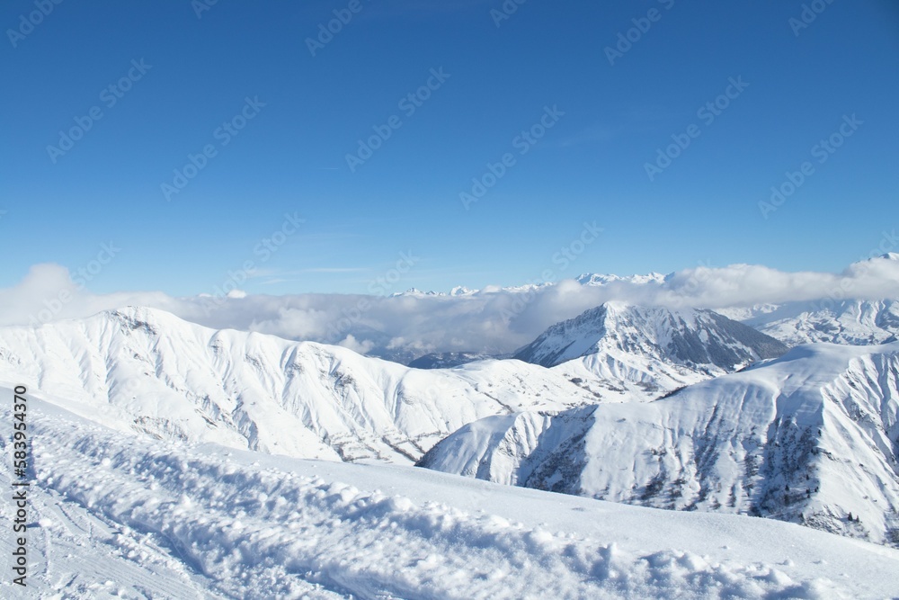 Aerial view of snow covered mountain landscape