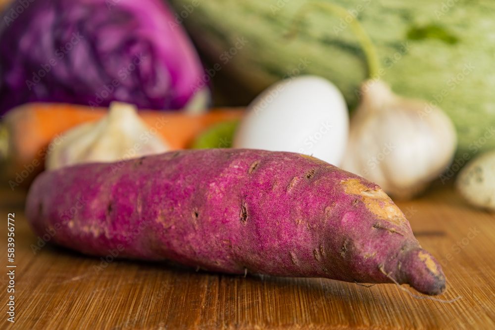 Various colorful vegetables on a rustic light wood background. Various colorful vegetables on a rustic light wood background.