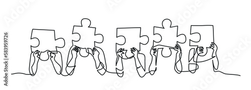 People putting puzzle pieces together.