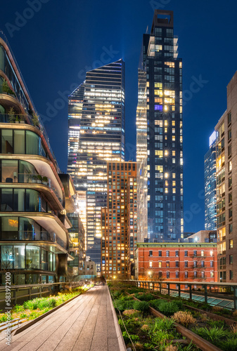 Canvas Print New York City Highline promenade with Hudson Yards skyscrapers at night