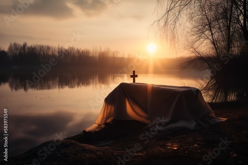 Beautiful photo illustration of an Easter morning sunrise with a cross and burial fabric by a calm lake The warm light almost announces Jesus s rising from the dead. Generative AI