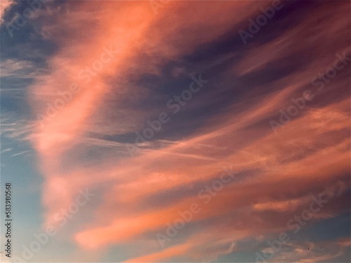 Blue sky with red clouds at sunset