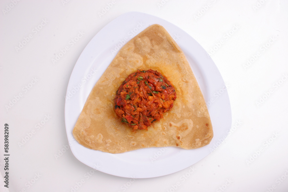 Paratha with vegetables in a plate, indian food Paratha with vegetables in a plate, indian food
