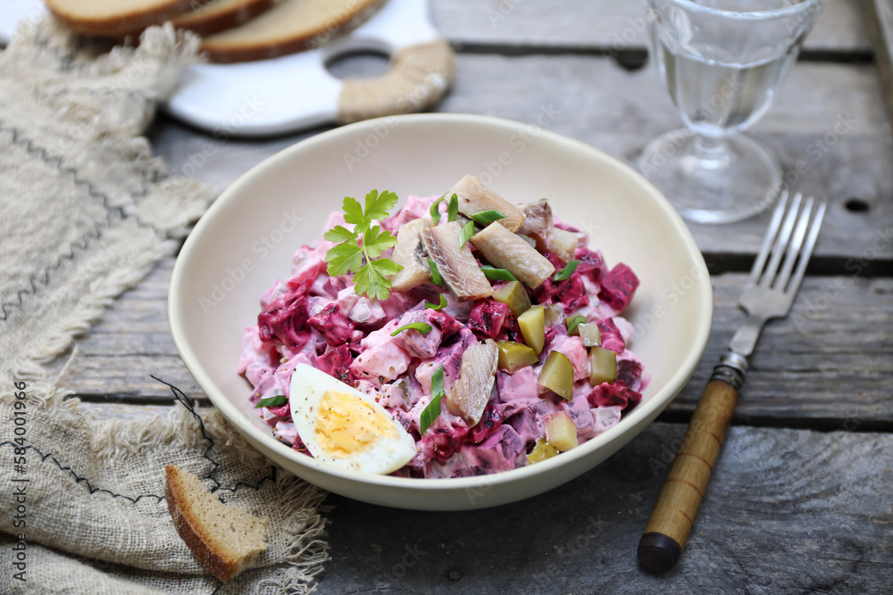 Heringsalat. Beetroot salad with herring, parsley and egg dressing Heringsalat. Beetroot salad with herring, parsley and egg dressing