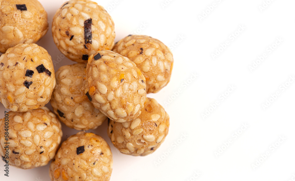 Rice Cracker Ball with Seaweed on a White Background Rice Cracker Ball with Seaweed on a White Background
