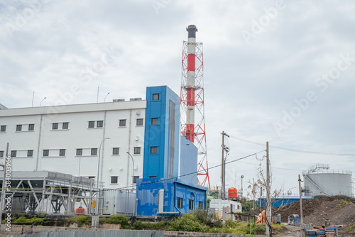 Admin building on the power plant area. The photo is suitable to use for industry background photography, power plant poster and electricity content media.