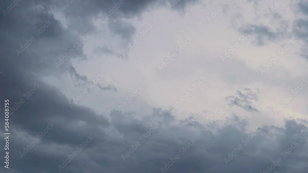 Overcast Stormy Sky in Sunlight with Dark Cumulus Swirl Clouds Timelapse. Bad Weather, Wet Climate, Meteorology, Forecast. Storm Skyscraper and Black Gray Clouds, Atmosphere. Overcast Stormy Sky in Sunlight with Dark Cumulus Swirl Clouds Timelapse. Bad Weather, Wet Climate, Meteorology, Forecast. Storm Skyscraper and Black Gray Clouds, Atmosphere.