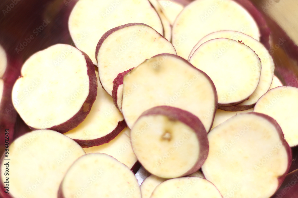 sliced sweet potato. sweet potato chunks. sliced natural food. sliced sweet potato. sweet potato chunks. sliced natural food.