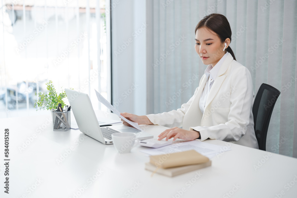 Confident young asian businesswoman working with tablet Start up small business owner. business successful technology concept Confident young asian businesswoman working with tablet Start up small business owner. business successful technology concept