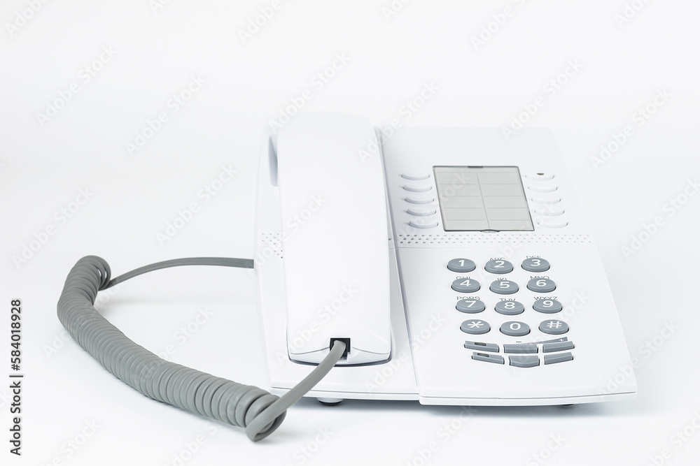 White office desk phone isolated on white White office desk phone isolated on white