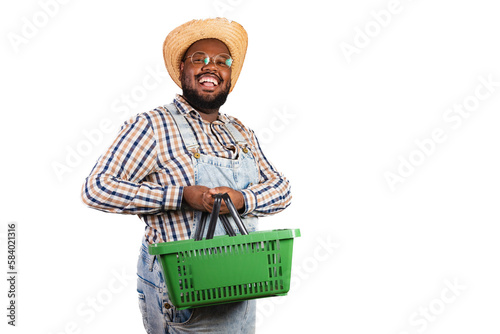 brazilian black man wearing country clothes from festa junina, festa de são joão. arraiá, holding market basket, shopping, promotions. photo