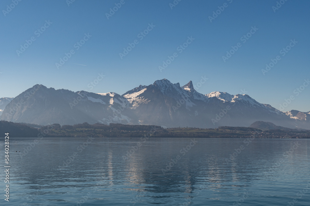 Waterfront at the lake of Thun near Oberhofen in Switzerland Waterfront at the lake of Thun near Oberhofen in Switzerland