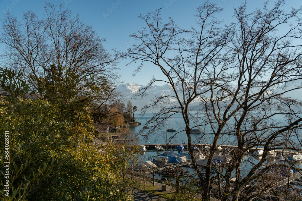 Pretty view over the lake of Thun in Hilterfingen in Switzerland Pretty view over the lake of Thun in Hilterfingen in Switzerland