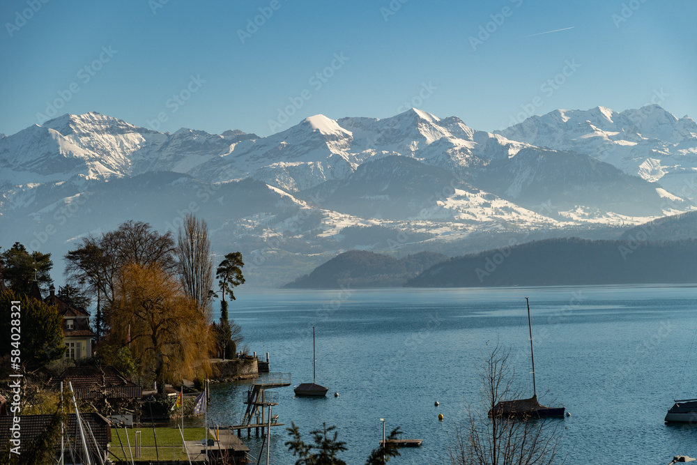 Pretty view over the lake of Thun in Hilterfingen in Switzerland