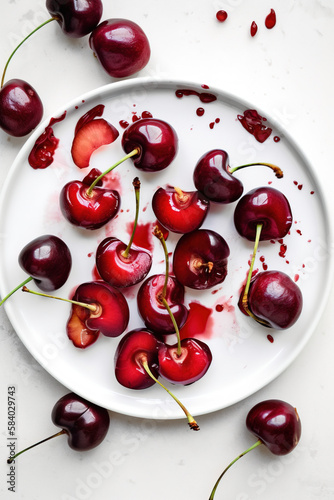 cherries on a white plate 