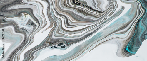 Fluid art background with light blue tints on white stony surface. Liquid ink marble imitation. Marbling effect of acrylic paints on canvas. Abstract marble texture with mixing colors. Modern interior