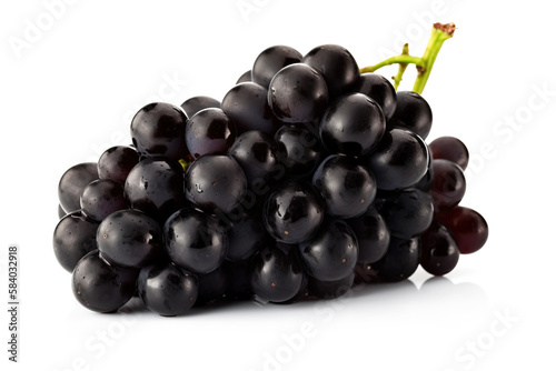 Vine of fresh blue Black Corinthian grapes, isolate on white background. Sprig of organic natural food. AI generated.