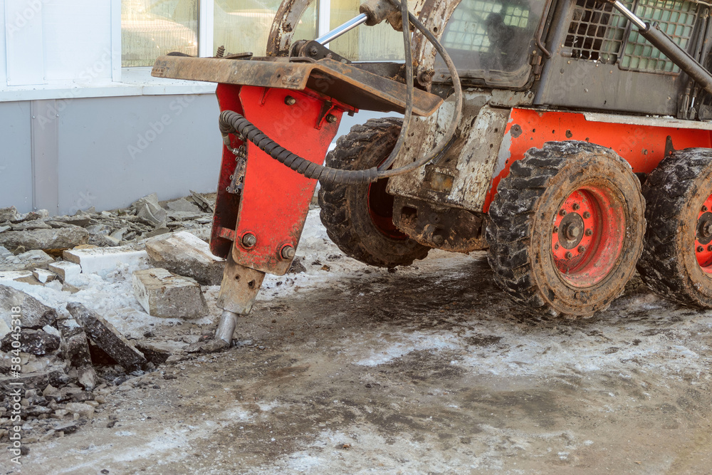 Hydraulic jack hammer destroy crushes frozen asphalt Hydraulic jack hammer destroy crushes frozen asphalt