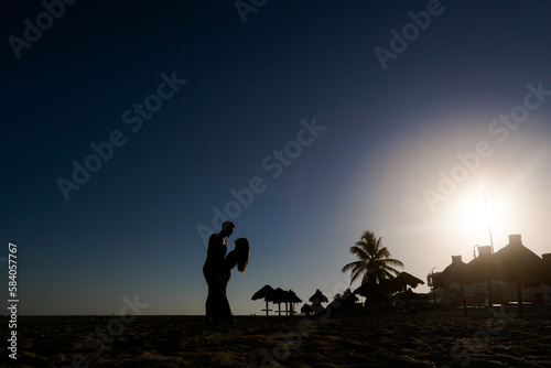 Happy Couple in Progreso beach in Mexico