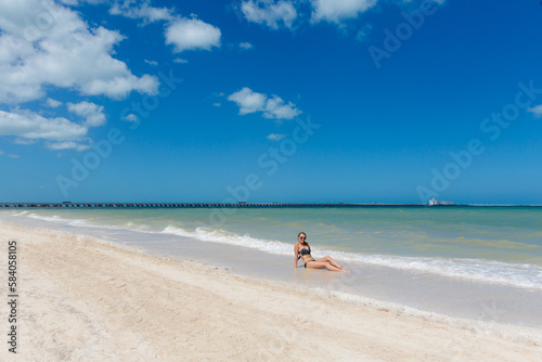 Woman in Progreso beach in Mexico