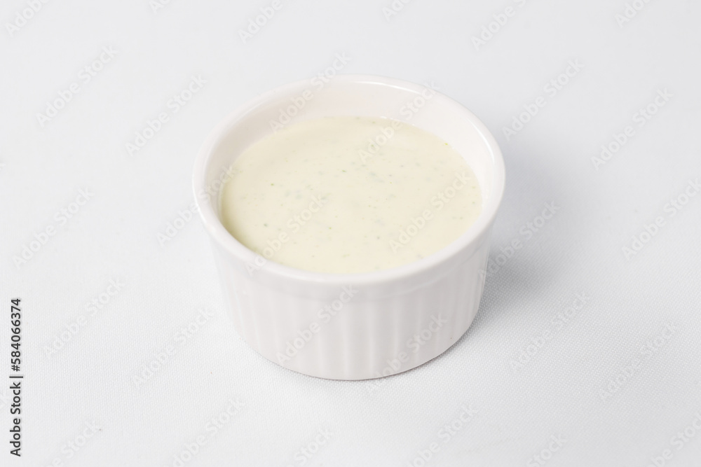 white sauce, mayonnaise on a white background white sauce, mayonnaise on a white background