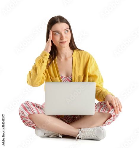 Pretty young woman with lap...